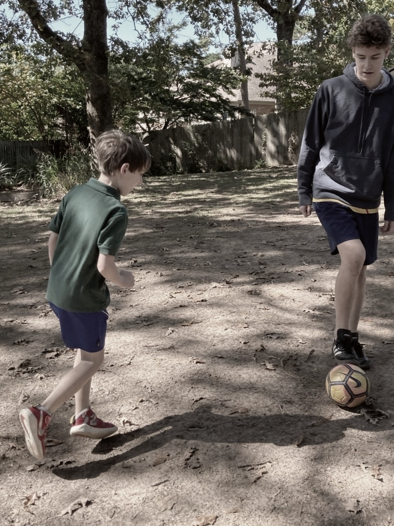 kid playing soccer